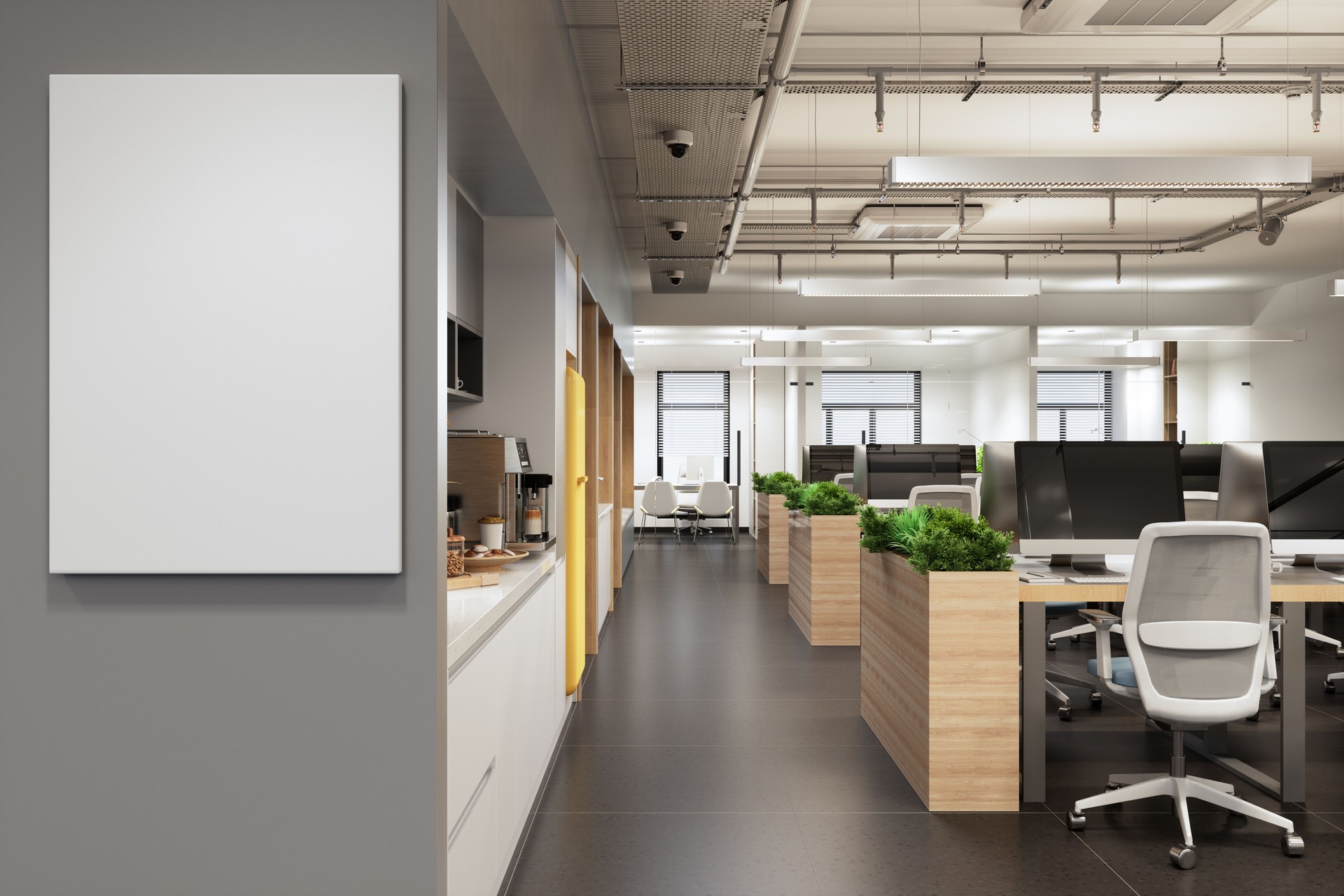 Interior Of An Empty Modern Open Plan Office With Empty Poster On The Wall